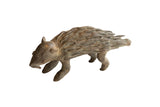 Vintage handmade African porcupine sculpture with rustic, textured quills and a dark aged patina.