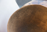 Antique African wooden bowl, rich brown patina and hand-carved rim.
