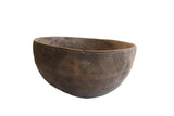 Antique African hand carved wooden bowl, incised designs, visible repairs, and deep patina.