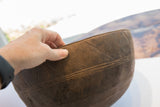 Aged dark wood of antique hand-carved Nupe bowl, with incised designs.