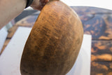 Aged wooden exterior of the hand-carved African bowl, with rich natural texture.