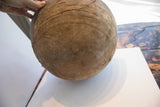 Antique African hand carved bowl, showing incised patterns and aged brown wood texture.