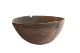 Late 19th-century African hand carved wooden bowl from Nupe, with incised designs and old repairs.