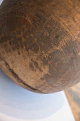 Antique hand carved wooden bowl detail, showing incised star design and patina.