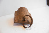 Rustic iron patina and curved loop handle on the vintage Yoruba bell.
