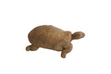 Vintage African tortoise sculpture with a textured, hand-carved geometric shell.