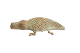 Vintage African alligator sculpture with textured criss-cross scales and an aged green patina.
