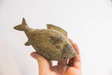 Textured vintage African fish casting with hand-engraved patterns and weathered patina.