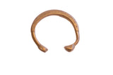 Antique African snake cuff bracelet with an aged bronze patina and etched details.
