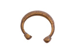 Antique African snake cuff bracelet with a rich, hand-wrought patina and etched details.