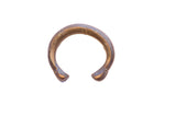 Antique African snake cuff bracelet with a warm, aged patina and incised details.