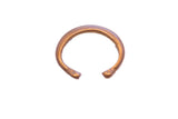 Antique African copper snake cuff bracelet with handcrafted texture and warm patina.