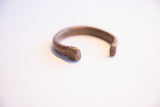 View of the antique snake cuff's opening, highlighting the hand-worked texture.