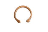 Antique handmade African snake cuff bracelet with a warm bronze patina and smooth, open design.