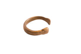 Antique African snake cuff bracelet with a handmade, open form and warm, aged patina.