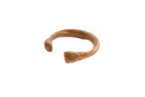 Hand-forged antique African snake cuff bracelet with a warm, aged patina.