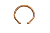 Antique African snake cuff bracelet with a simple open design and aged bronze patina.