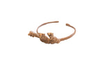 Vintage African Baole Dogon figurine cuff bracelet with a rustic, patinated metal finish.