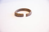 Detail of the opening on the vintage African cuff bracelet showing its aged patina.