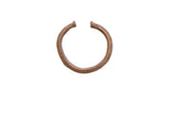Vintage African cuff bracelet with an open design and textured bronze patina.