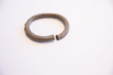 The textured opening of the vintage African cuff showing handmade craftsmanship.