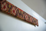 Angled view of the decorative Karabagh rug art highlighting its thickness and woven texture.