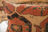 Hand-knotted texture of antique Persian Bijar pillow, showing terracotta, beige, blue, green pattern.