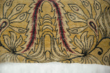 Saffron yellow antique Kerman rug fragment with expressive art nouveau motifs.