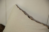 Textured light fabric backing of the Antique Ziegler Mahal rug fragment pillow.