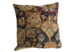 Antique Kerman rug fragment pillow with lustrous cochineal red, powder blue, dusty orange floral motifs. 24x24.