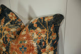 Antique Ziegler Mahal fragment pillow, detailed worn texture of teal, rust, and beige.