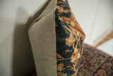 Antique Ziegler Mahal rug fragment pillow, featuring aged blue and orange patterns and neutral textured backing.