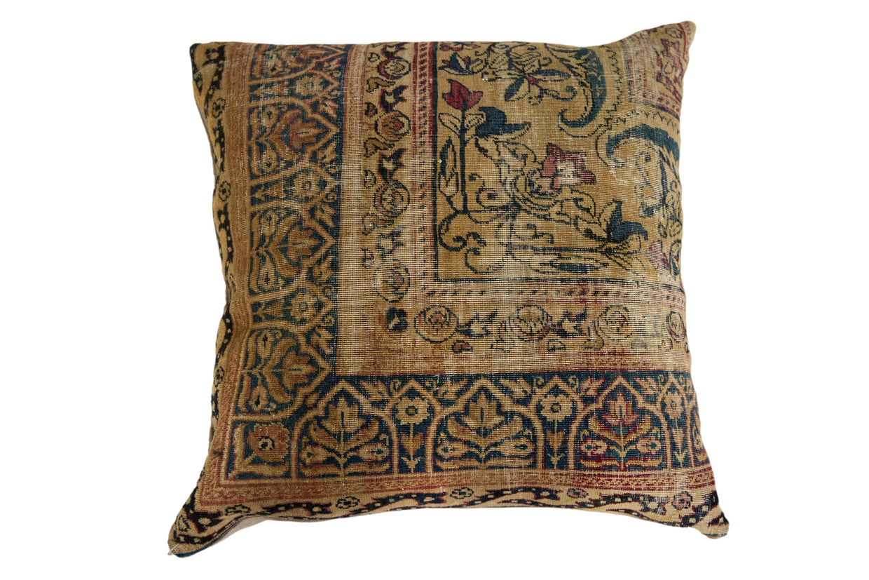 Antique Kerman rug fragment pillow with art nouveau floral motifs in saffron, teal, and red.