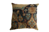 Antique Kerman Rug Fragment Pillow, lustrous wool with intricate floral design; rich reds, blues, oranges.