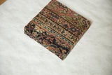 Angled view of the antique Fereghan cork board highlighting its woven texture and depth.