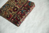 Profile view of the decorative art board, showing its thickness and antique rug texture.