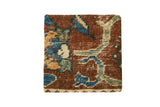 Antique Ziegler Mahal rug art with blue and green vine tendrils on a chestnut brown field.