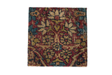 Antique Kerman rug fragment art, thousand flower motif in cochineal red, sapphire blue, and gold.