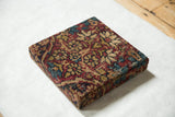 Kerman rug art corner detail, showcasing cochineal red and sapphire blue thousand flower pattern.