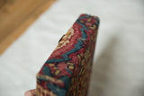 Antique Kerman rug fragment edge featuring dense thousand flower design in sapphire blue and cochineal red.