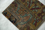 Fine wool pile and visible foundation on the corner of an antique Kerman rug fragment.