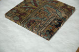 Angled profile of the decorative art showing the wrapped antique Kerman wool fragment.