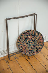 Reclaimed side table shown disassembled with its antique Fereghan rug top and metal stand.