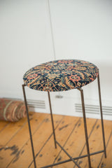 Reclaimed antique rug fragment side table top, intricate navy Persian Fereghan pattern with ivory and saffron.