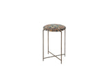 Side table with a round, cushioned top from an antique Persian rug in navy and saffron on a vintage metal base.