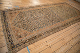 Angled perspective of the vintage Malayer runner showing its full length and traditional Herati design.