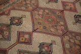 Vintage Malayer rug: detailed camel seeded field, dark brown medallions with coral and blue.
