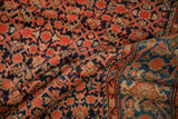 Richly colored Herati field beside the Turtle Samovar border on a vintage Malayer carpet.