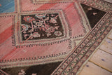 Expressively drawn medallion and worn, even pile on a vintage Persian Malayer rug corner.