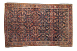 Antique Fine Malayer rug with an intricate Herati motif on a navy blue field, 4'5